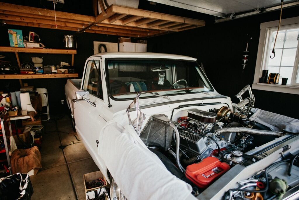 Mobile ECU remapping technician with diagnostic laptop at a vehicle in Hinckley Leicestershire